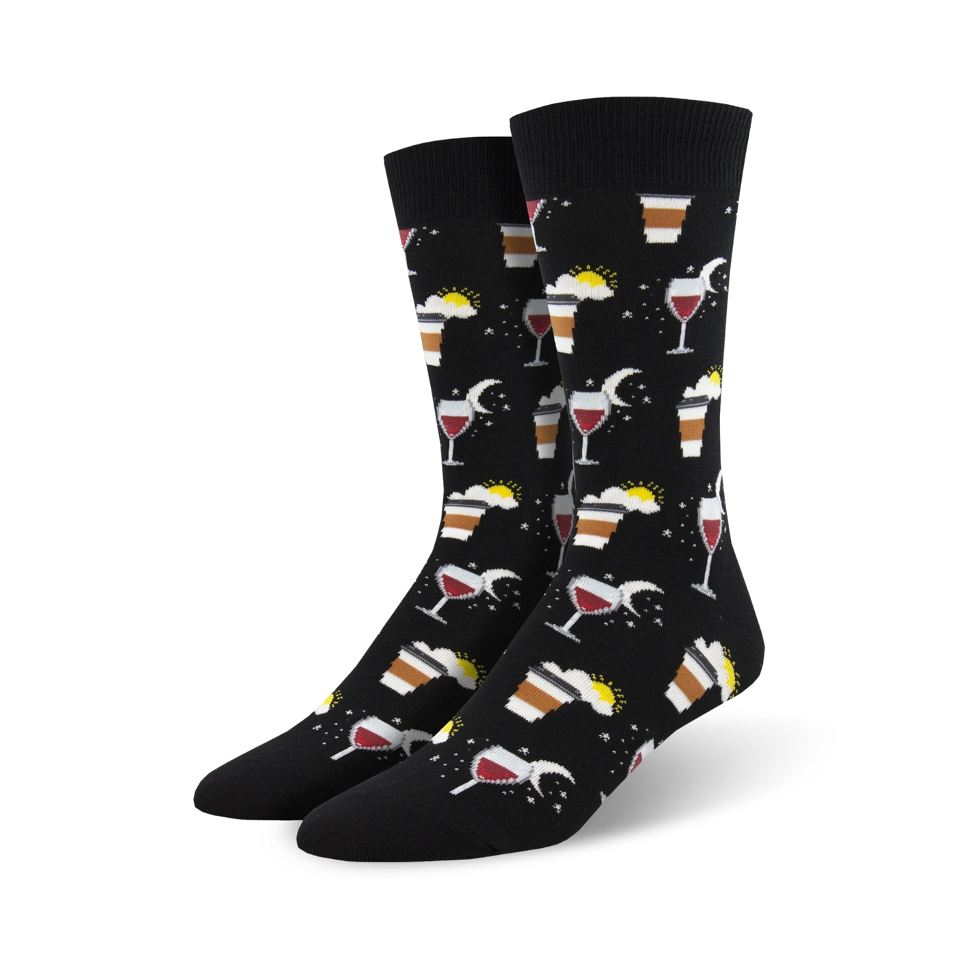 A pair of black crew socks with a fun design featuring coffee cups, wine glasses, suns, and moons. 