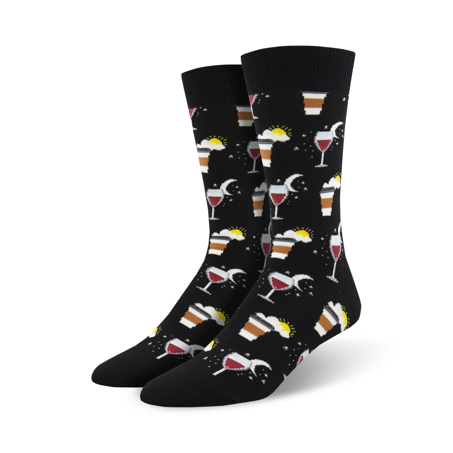 A pair of black crew socks with a fun design featuring coffee cups, wine glasses, suns, and moons. 
