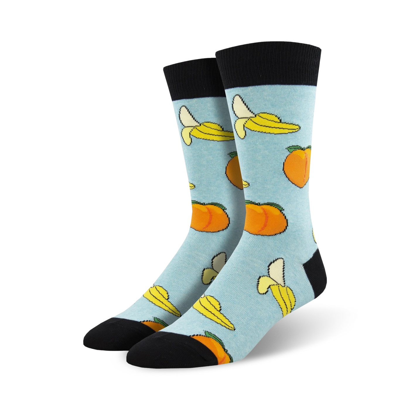 Pair of light blue crew socks with a whimsical pattern of yellow bananas and orange peaches.