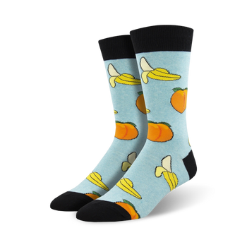light blue crew sock with cartoonish bananas and peaches pattern for men  