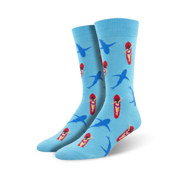 blue crew socks with pattern of women in red bikinis surfing, sharks with open mouths.  