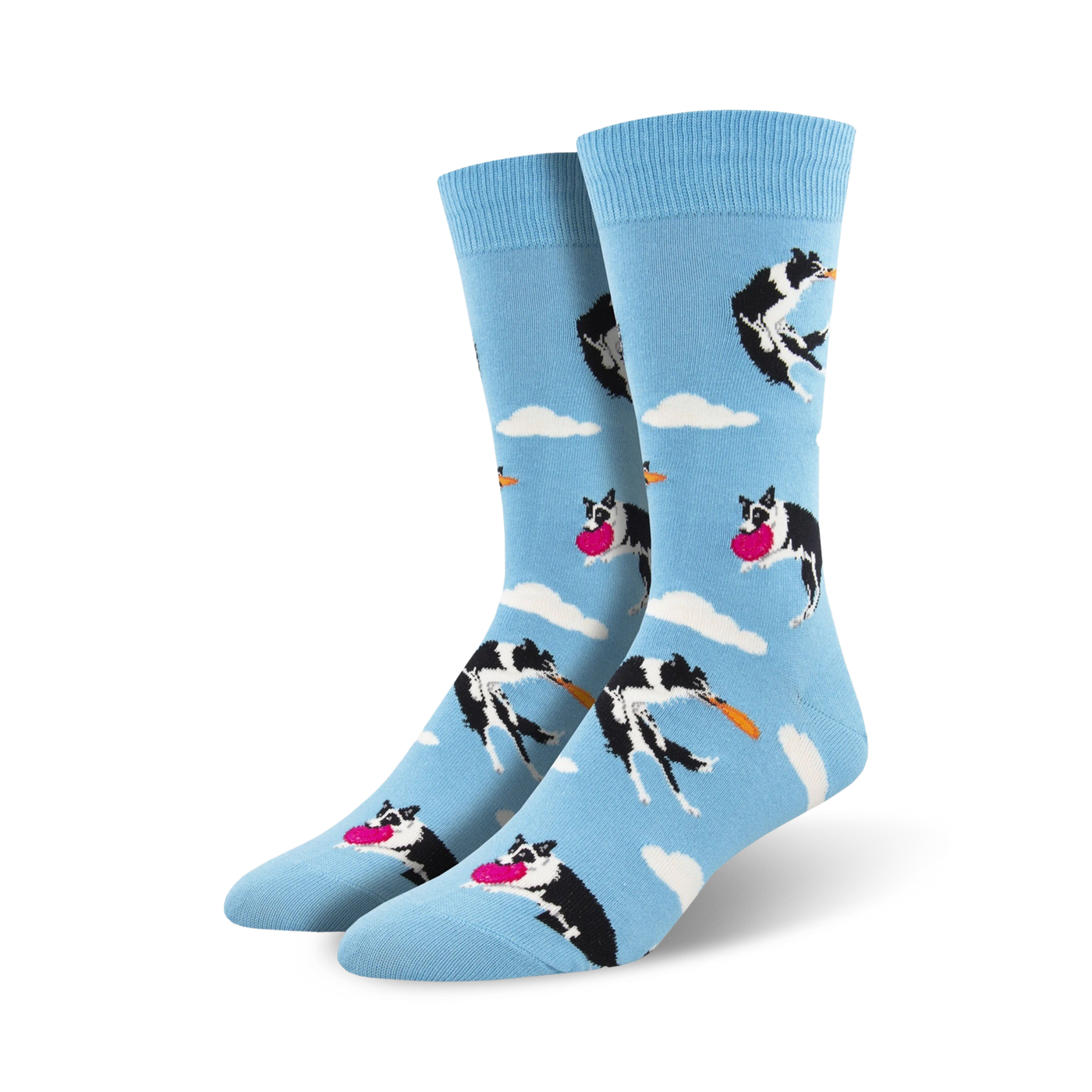A pair of crew socks in light blue.  The design features black and white border collies catching pink frisbees against a cloudy sky.