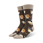 Pair of brown crew socks with a repeating pattern of cats in cardboard boxes.  The cats are orange, black, and gray.