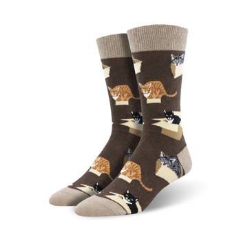 men's brown crew socks adorned with a pattern of colorful cats sitting in boxes.  