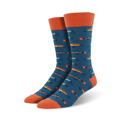 mens blue crew socks with orange cuff and allover print of orange fish and black fish hooks.  