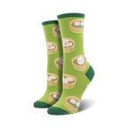 Lifestyle shot of a person wearing the green 'Cute As A Dumpling' socks with jeans and sneakers.