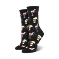 Pair of crew socks in black and blue, featuring a whimsical design of coffee cups, wine glasses, suns, and moons.