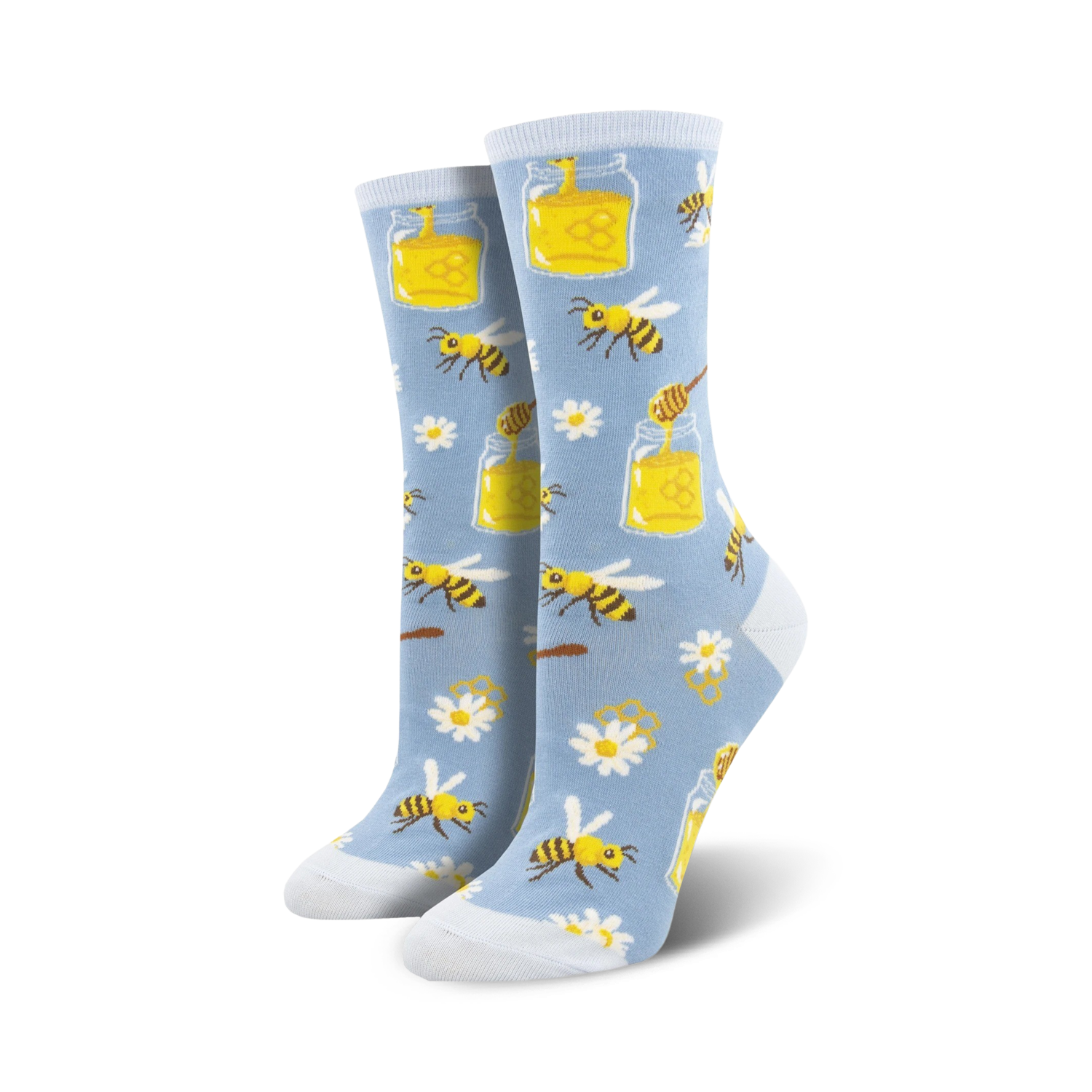 Pair of women's crew socks in light blue and orange. The socks feature a whimsical design of bees, honey jars, daisies and honeycomb.