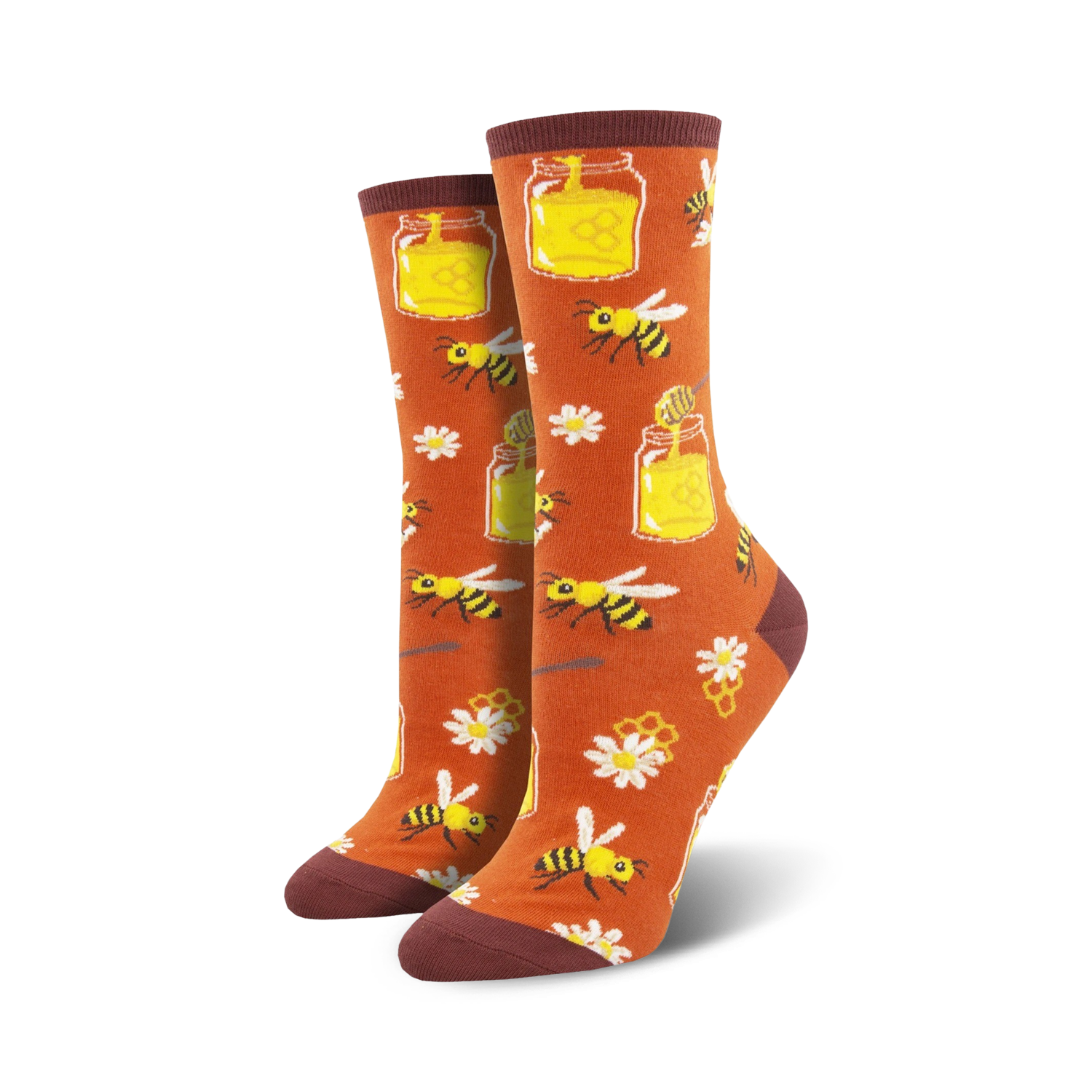Lifestyle shot of 'Bee My Honey' socks on a person's feet, showcasing the socks' orange colorway and fun design.