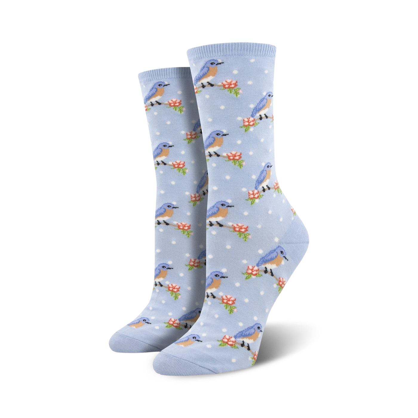 Pair of women's crew socks in light blue.  Features a pattern of small bluebirds perched on branches with tiny pink flowers on a light blue polka dot background.