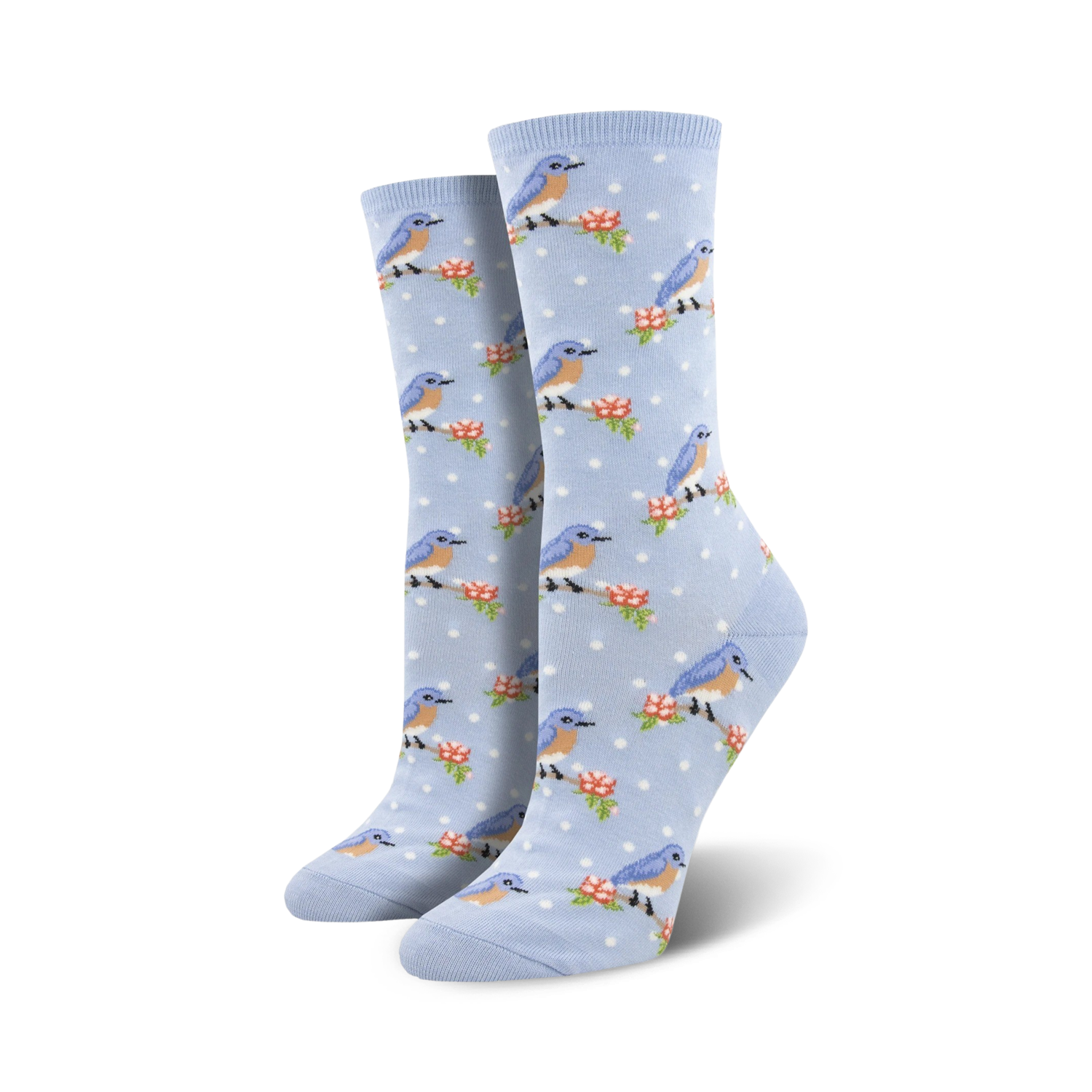 Pair of women's crew socks in light blue.  Features a pattern of small bluebirds perched on branches with tiny pink flowers on a light blue polka dot background.