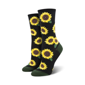 black crew socks with pattern of yellow sunflowers, brown centers, and green leaves. green toes and heel. womens.  