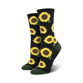 black crew socks with pattern of yellow sunflowers, brown centers, and green leaves. green toes and heel. womens.  