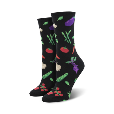 women's crew socks featuring a vibrant pattern of eggplant, garlic, tomatoes, cucumbers, radishes, and carrots on a black background.   