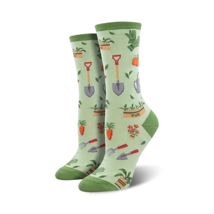 green crew socks with gardening tools and vegetable motif for women (carrots, gloves, shovels, plants, bouquets). 