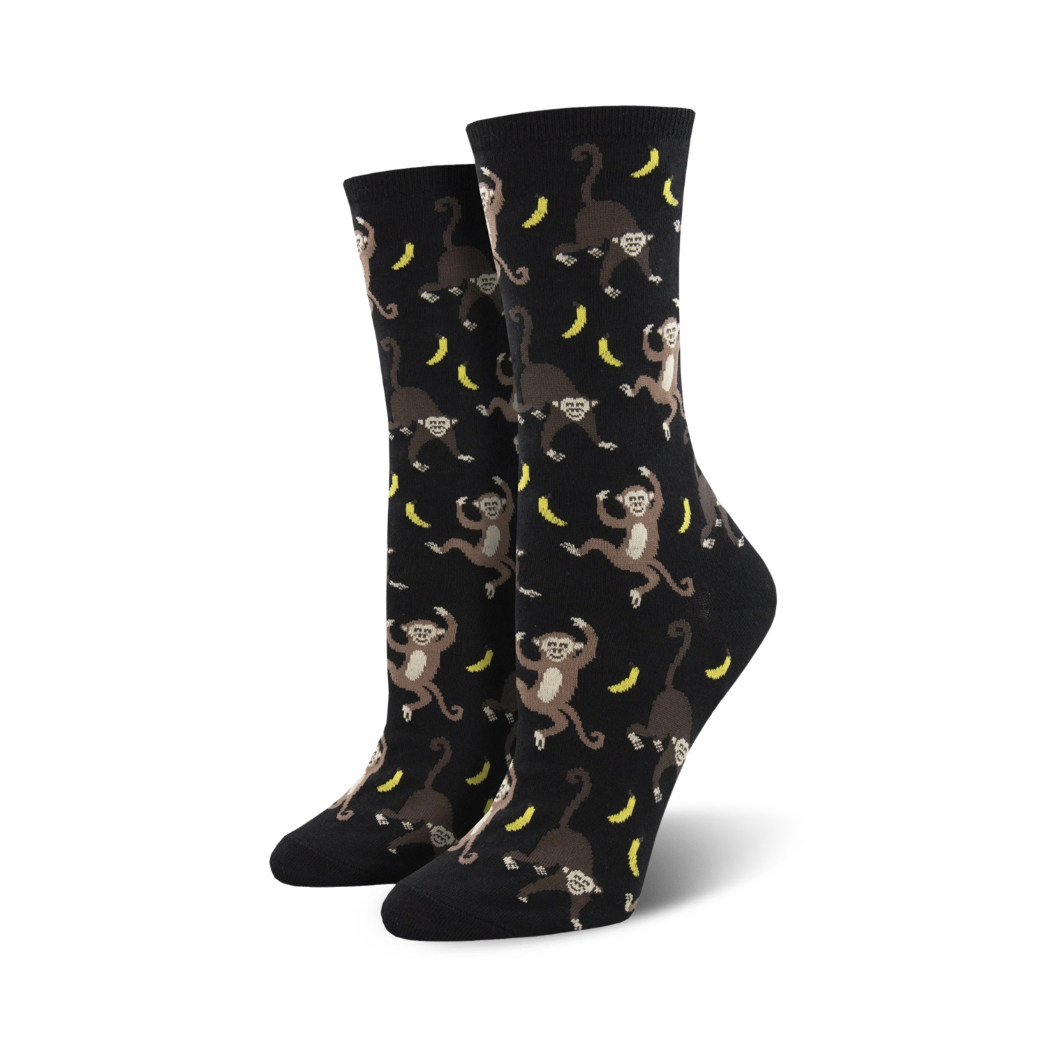 Pair of black crew socks with a playful all-over print of monkeys swinging from bananas. 