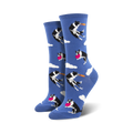Pair of women's crew socks. Blue background with repeating pattern of black and white border collies catching pink and orange frisbees.
