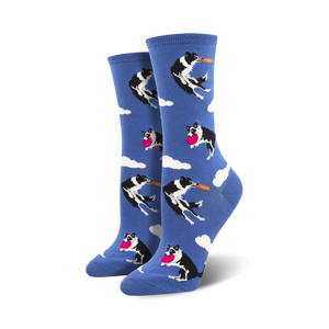  women's crew socks featuring a pattern of black and white border collie dogs leaping to catch a frisbee against a background of white clouds on a blue sky.  