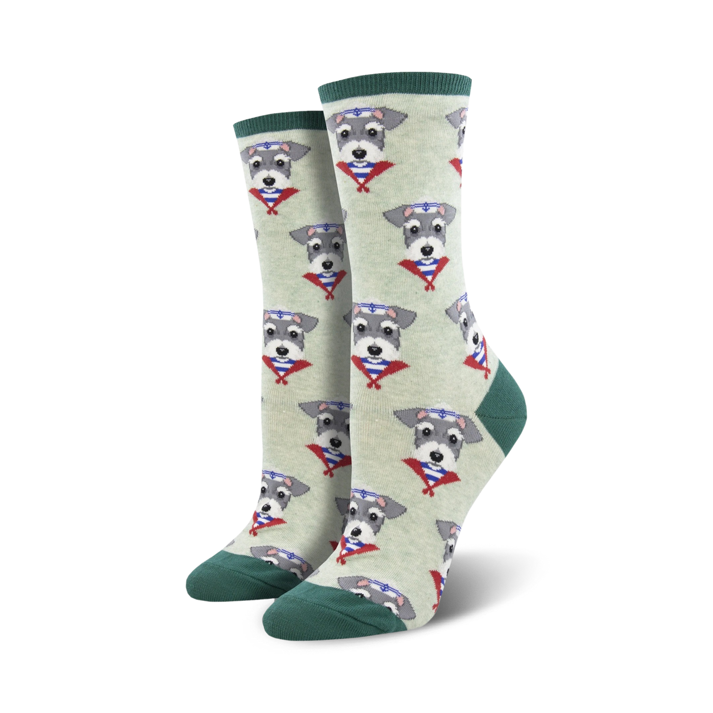 Lifestyle shot of a person's feet wearing the sage green Snazzy Schnauzer socks. The socks are shown on a wooden floor.