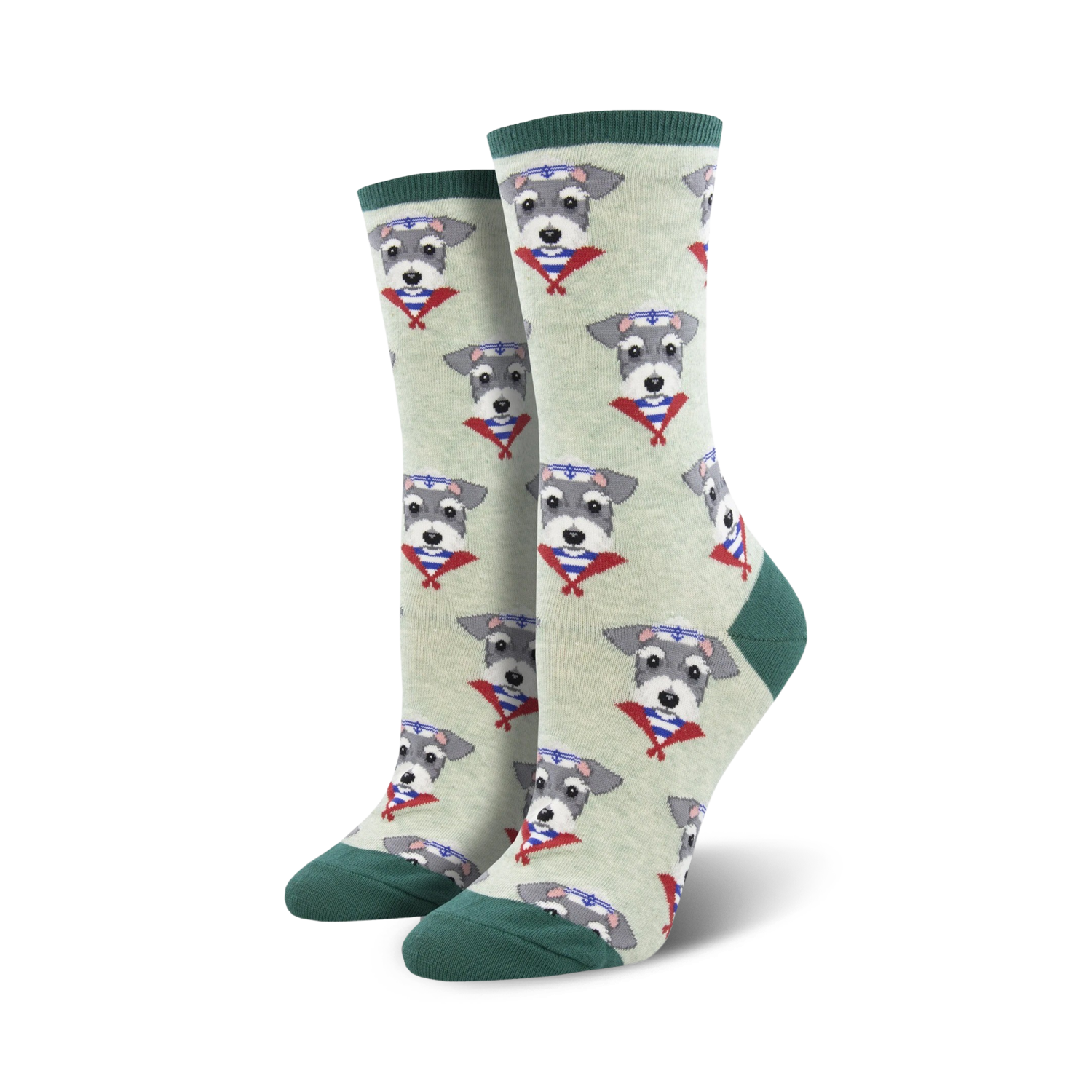 Lifestyle shot of a person's feet wearing the sage green Snazzy Schnauzer socks. The socks are shown on a wooden floor.