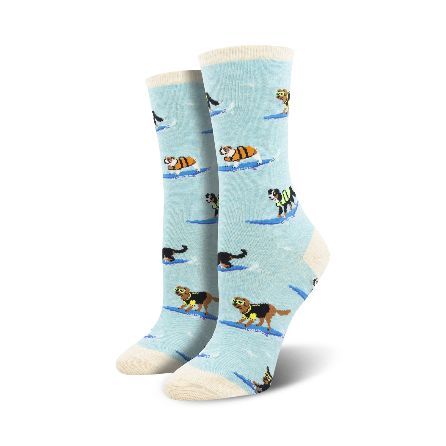 Lifestyle shot of a woman wearing the light blue surfing dogs socks. Shows the socks on feet with jeans.