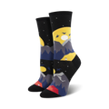 Pair of crew socks showcasing a nighttime mountain scene. The socks are primarily black with yellow moons, gray mountains, dark blue hills, and a small red tent.