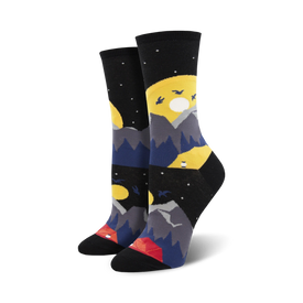 black crew socks with a pattern of blue and gray mountains, yellow moons, red and orange tents, and white stars. perfect for camping and hiking enthusiasts.  