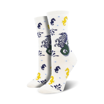 Cream crew socks with navy and yellow seahorses and hippocampus designs.  A whimsical ocean-themed sock.