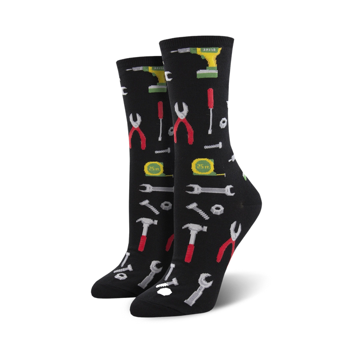 black crew socks adorned with a pattern of wrenches, screwdrivers, pliers, hammers, nails, nuts and bolts.  }}