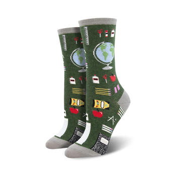 dark green study buddies crew socks made for women feature a colorful pattern of school supplies.    