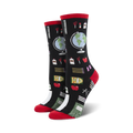 Lifestyle shot: A person's feet wearing black Study Buddy socks with red cuffs.