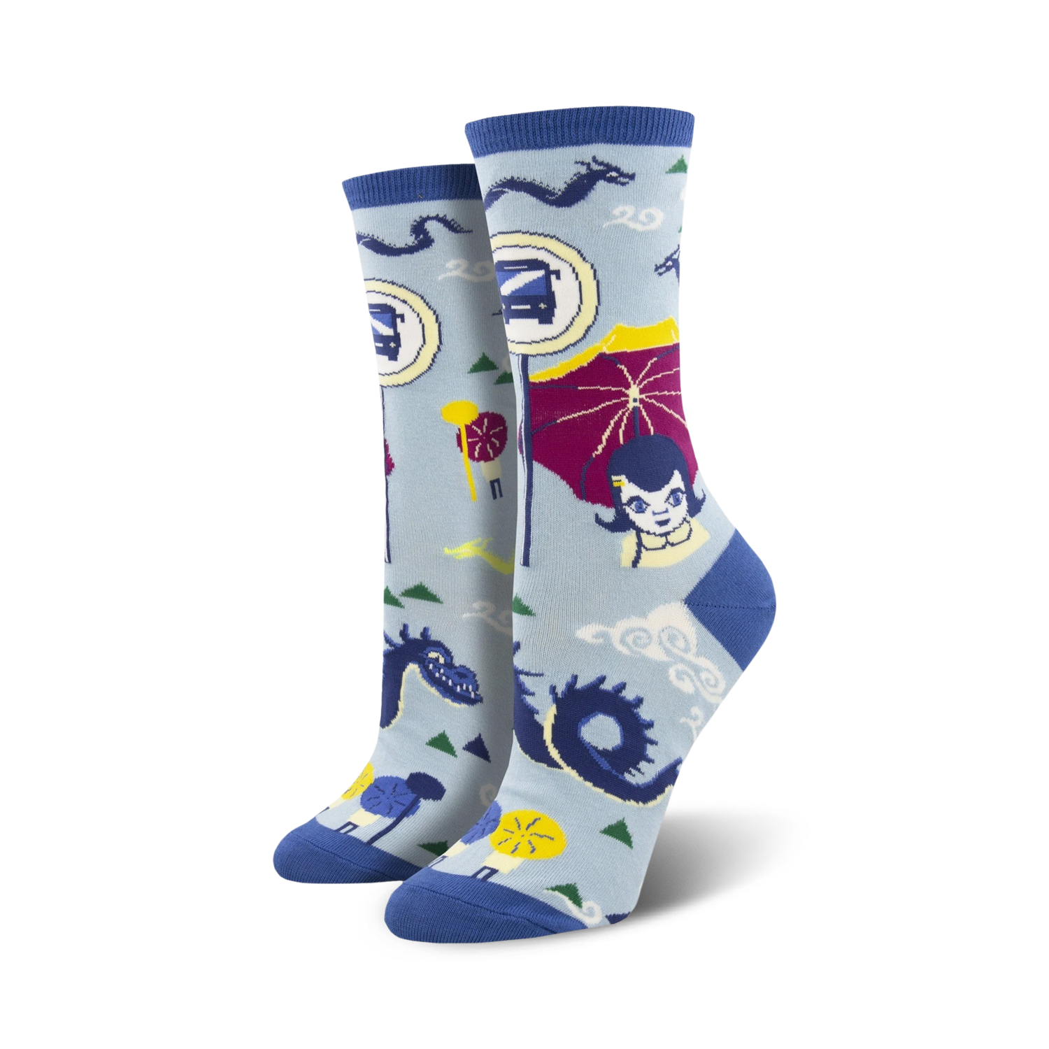 Women's crew socks in light blue and teal, featuring an illustrated bus stop scene with dragons, parasols, and a girl.  Fun and quirky design!