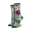 A close-up of the same 'Bus Stop' socks, but this time on a green background. The design elements are identical.