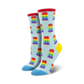 Pair of crew socks; light blue background with repeating rainbow popsicle pattern; blue and red accents at the toe and heel.