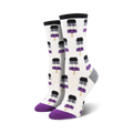 Pair of women's crew socks. White background with repeating pattern of black, white, and purple popsicles on sticks.