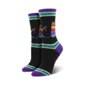 Crew socks featuring a rainbow cat design on a black background.  Purple, teal, and lime green accents. 