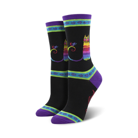 laurel burch rainbow cat crew socks for women showcase a vivid cat and bird pattern. funky geometric accent around the ankle. purple toe, heel.  