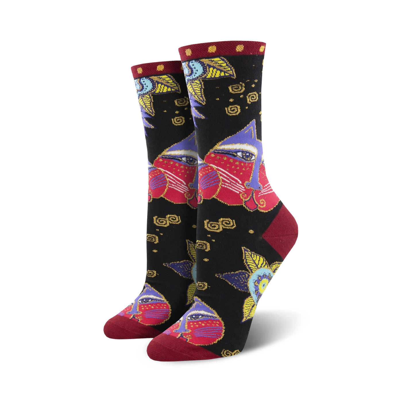 A pair of women's crew socks in black with a colorful design. The main pattern features stylized cat faces in shades of red, purple, and gold, along with smaller floral and geometric details.