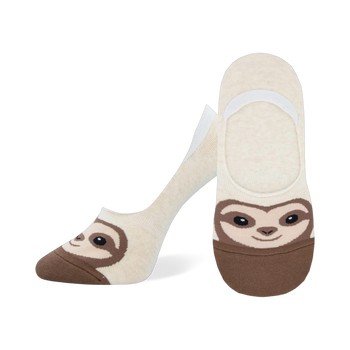 Pair of beige no-show socks with a brown sloth face design.  The sloth has cute, simple features.