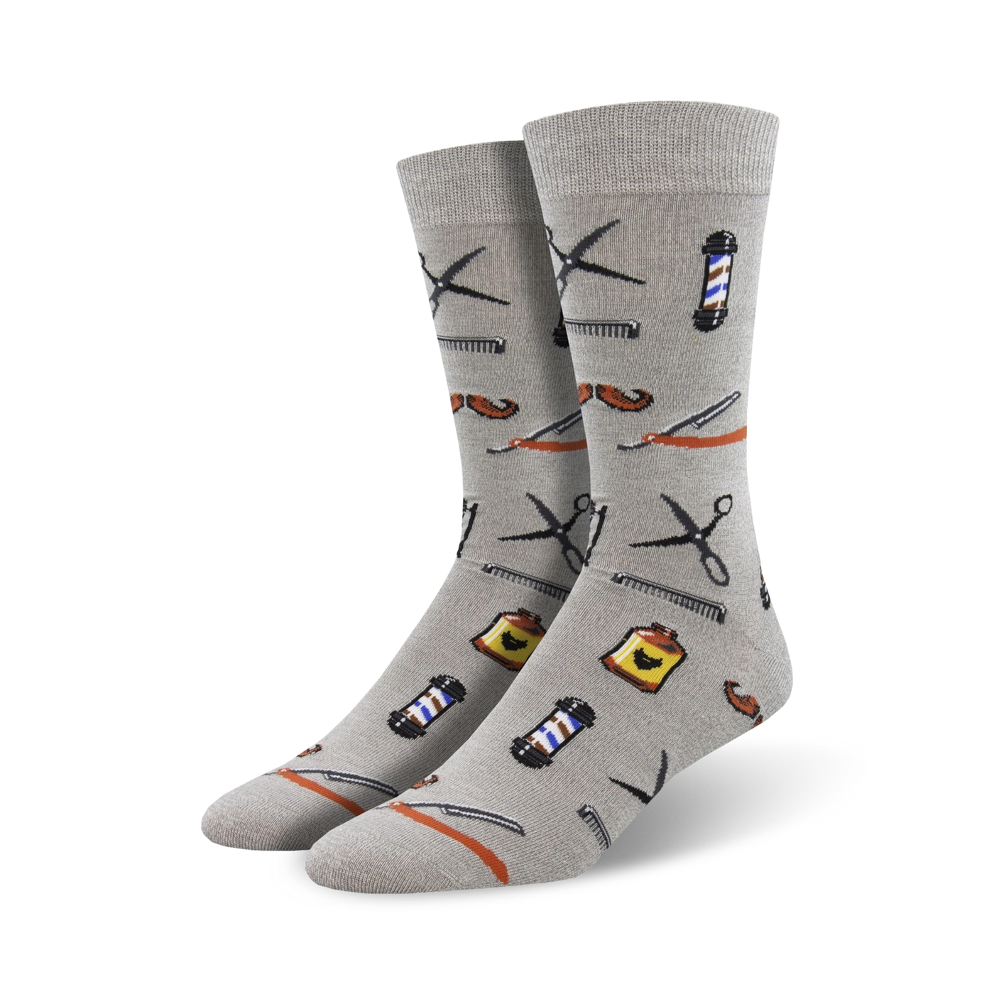 Pair of grey bamboo crew socks with a fun pattern of barber tools like scissors, combs, razors, and a barbershop pole.