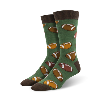 mens hut hut hike bamboo socks with pattern of brown footballs on field of green   