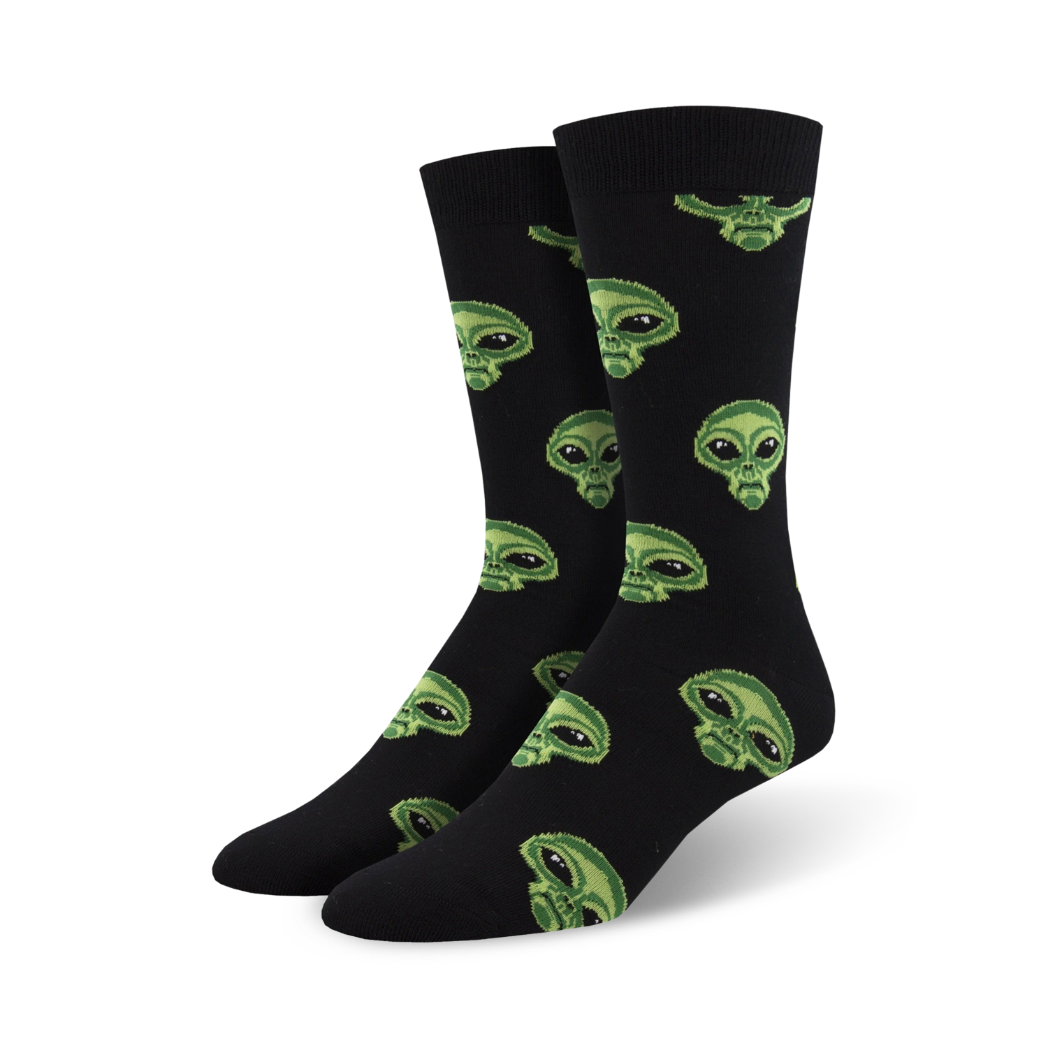 Pair of black crew socks with repeating alien face pattern in green.  Fun, quirky design for men and women.