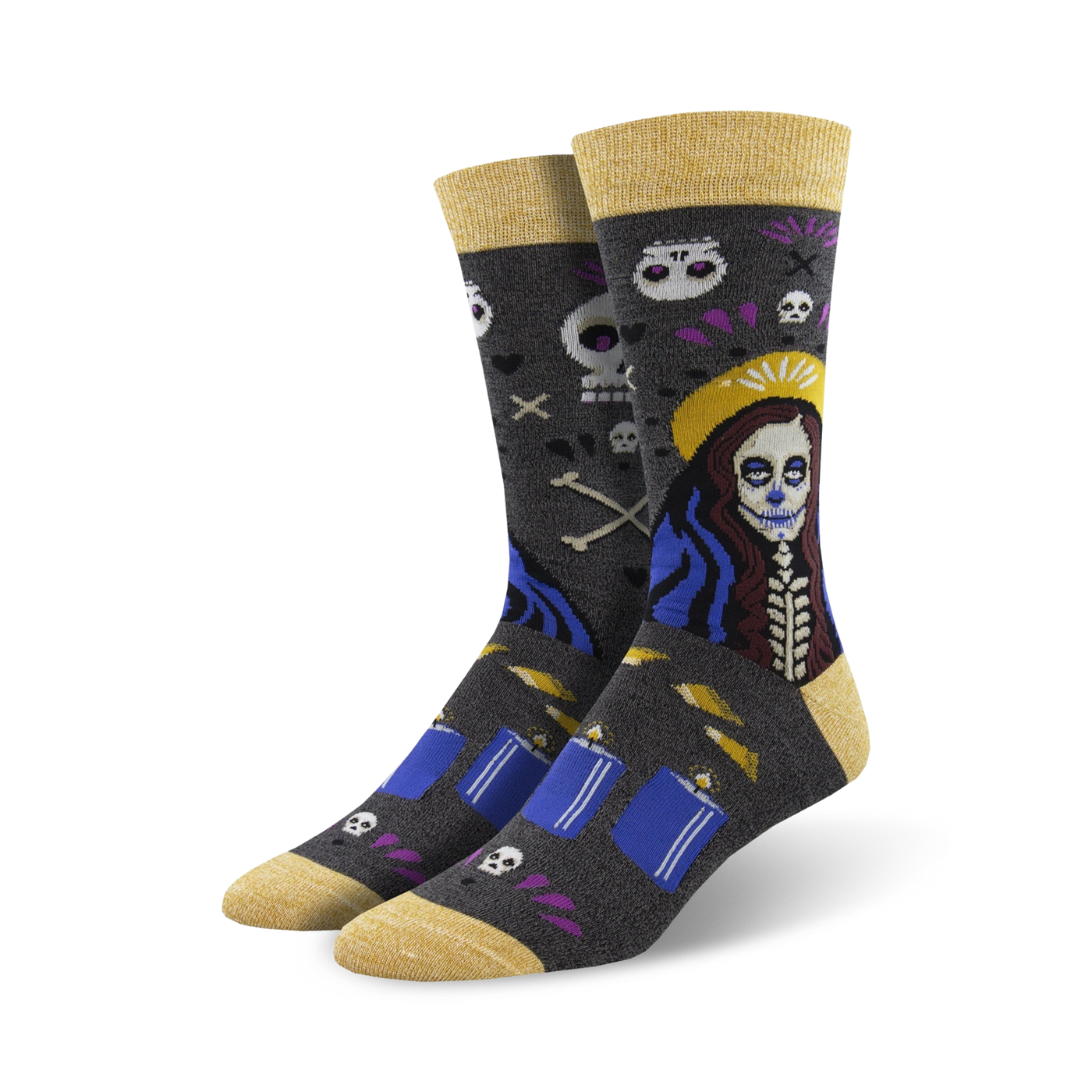 A pair of crew socks in dark grey with a Day of the Dead themed design. The main image shows a woman with sugar skull makeup, candles, and skulls.
