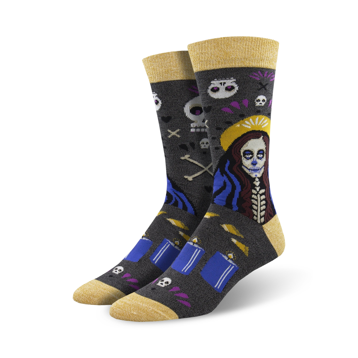 A pair of crew socks in dark grey with a Day of the Dead themed design. The main image shows a woman with sugar skull makeup, candles, and skulls.