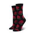 Pair of black crew socks with a repeating pattern of red roses and green stems. Made from soft bamboo.