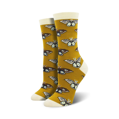 mustard yellow crew socks with a pattern of brown, black, and white moths with yellow and blue details  