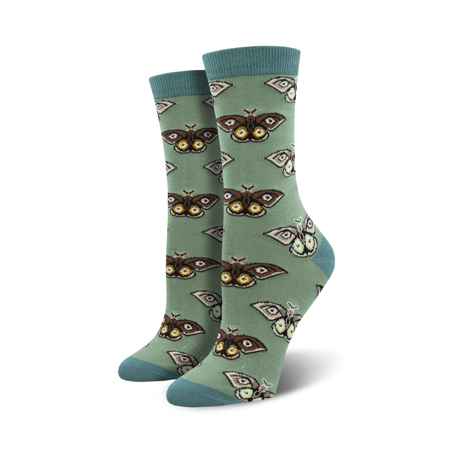 Close-up of a pair of sage green crew socks with a repeating pattern of brown and cream moths. Soft bamboo fabric.