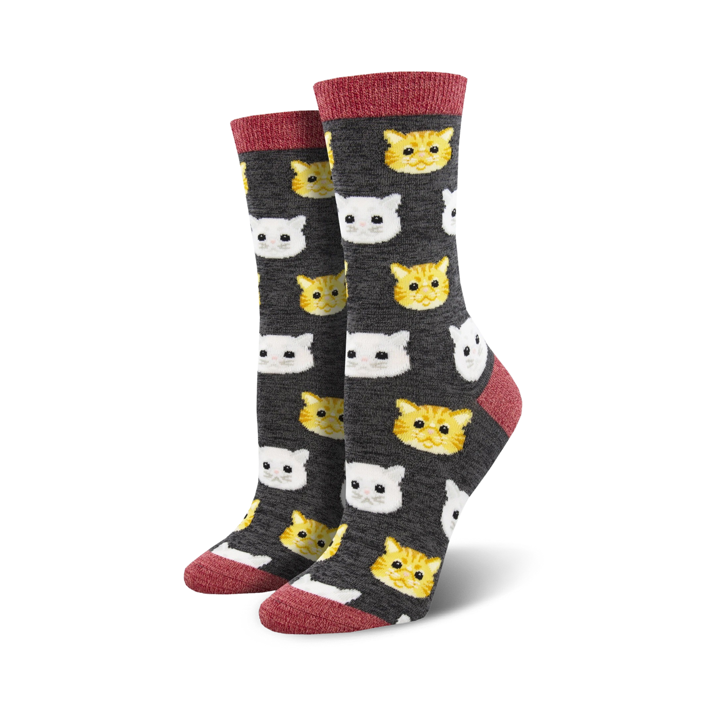 Crew socks with a charcoal grey background featuring a repeating pattern of cute orange and white cat faces. Red trim at the top.