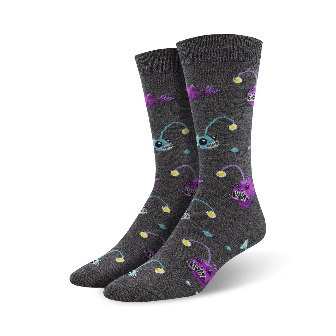 Pair of charcoal grey crew socks with a pattern of purple and teal anglerfish and yellow lights. Made from bamboo.
