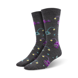 dark gray crew socks with purple and blue cartoon anglerfish pattern. mens.   